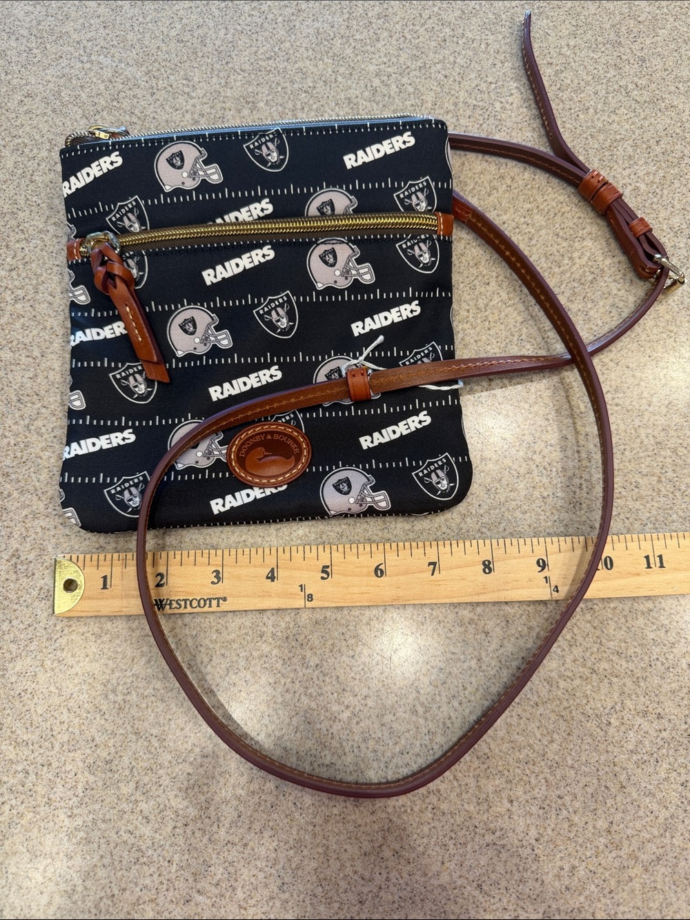 Dooney & Bourke Black Raiders Crossbody with Brown Leather Trim